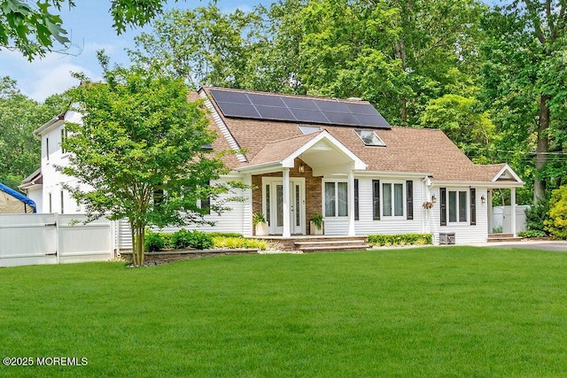145 Docare Rd, Jackson, NJ 08527 - view of front facade featuring roof mounted solar panels and roof with shingles