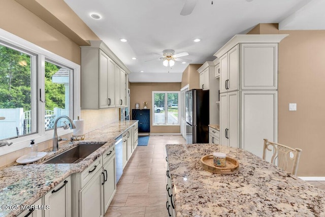 145 Docare Rd, Jackson, NJ 08527 - kitchen with stainless steel appliances, a ceiling fan, a sink, light stone counters, and recessed lighting