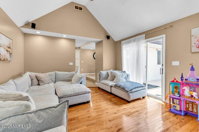 145 Docare Rd, Jackson, NJ 08527 - living room with high vaulted ceiling and light wood-type flooring