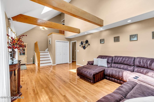145 Docare Rd, Jackson, NJ 08527 - living area with stairs, beam ceiling, recessed lighting, light wood-style floors, and baseboards