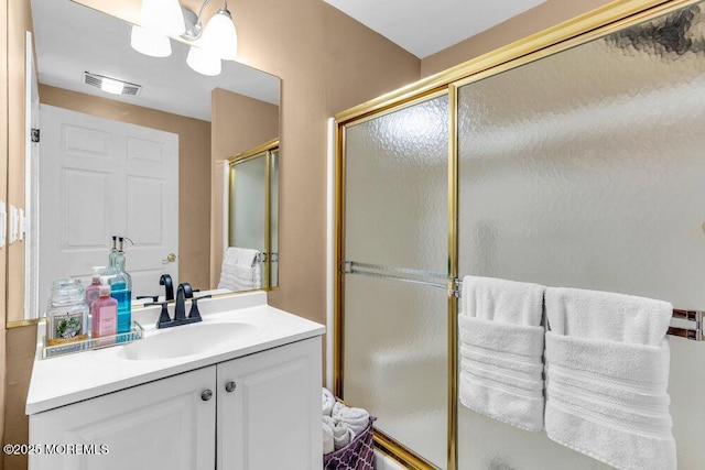 145 Docare Rd, Jackson, NJ 08527 - full bathroom featuring vanity, a shower with shower door, and a chandelier