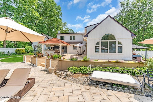 145 Docare Rd, Jackson, NJ 08527 - rear view of house with a patio area