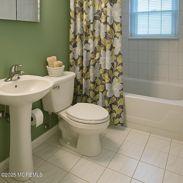 364 Westwood Ave Unit 26, Long Branch, NJ 07740 - bathroom featuring toilet, tile patterned flooring, shower / bath combo, baseboards, and a sink