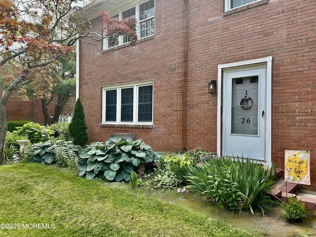364 Westwood Ave Unit 26, Long Branch, NJ 07740 - property entrance with brick siding and a lawn