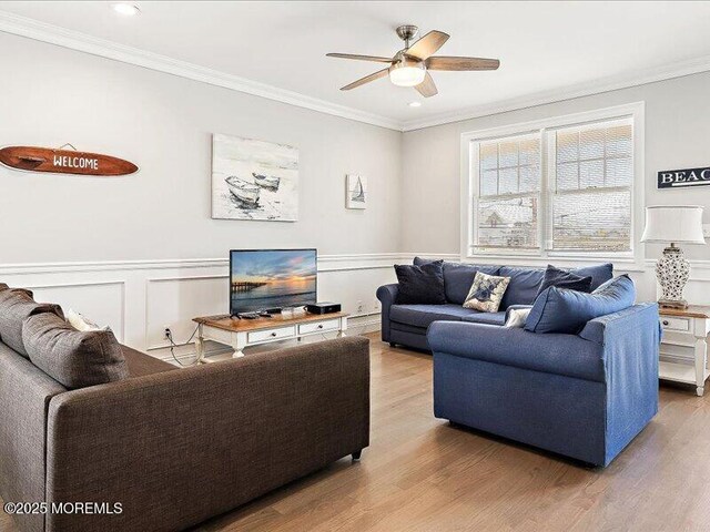 29 7th Ave Unit B, Seaside Heights, NJ 08751 - living area featuring ceiling fan, wood finished floors, crown molding, wainscoting, and recessed lighting