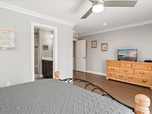 29 7th Ave Unit B, Seaside Heights, NJ 08751 - bedroom with crown molding, wood finished floors, baseboards, recessed lighting, and connected bathroom