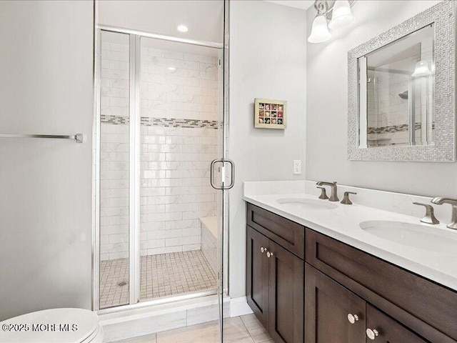 29 7th Ave Unit B, Seaside Heights, NJ 08751 - bathroom with a shower stall, double vanity, and toilet