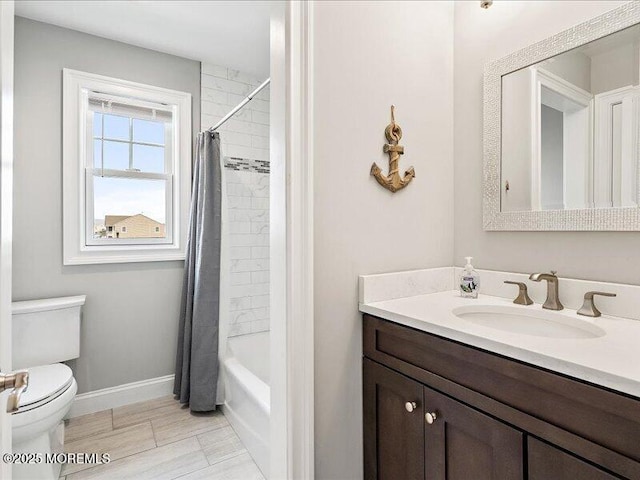 29 7th Ave Unit B, Seaside Heights, NJ 08751 - full bathroom featuring vanity, toilet, baseboards, and shower / bath combo with shower curtain