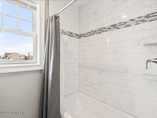 29 7th Ave Unit B, Seaside Heights, NJ 08751 - bathroom featuring shower / tub combo with curtain and healthy amount of natural light