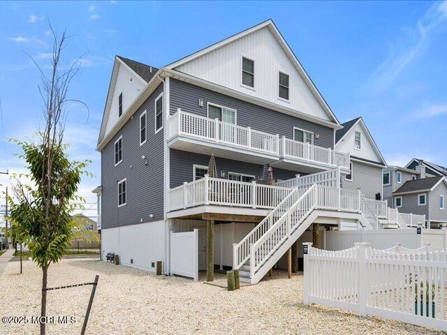29 7th Ave Unit B, Seaside Heights, NJ 08751 - rear view of property with stairway and a balcony