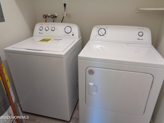 5D Wintergreen Ln, Whiting, NJ 08759 - laundry room with washing machine and dryer and electric panel