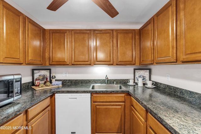 330 Shore Dr Unit 21, Highlands, NJ 07732 - kitchen with white dishwasher, a ceiling fan, stainless steel microwave, and brown cabinetry