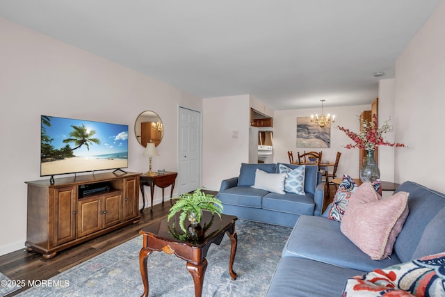 330 Shore Dr Unit 21, Highlands, NJ 07732 - living area with a chandelier and dark wood finished floors