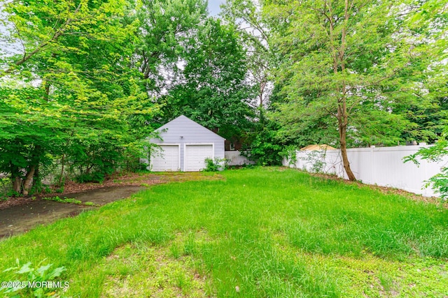 137 Seabreeze Way, Keansburg, NJ 07734 - view of yard with a detached garage and an outdoor structure