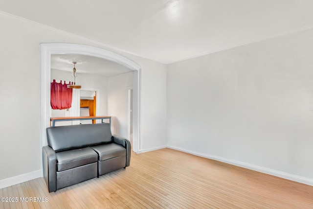137 Seabreeze Way, Keansburg, NJ 07734 - living area with hardwood / wood-style flooring, arched walkways, and baseboards