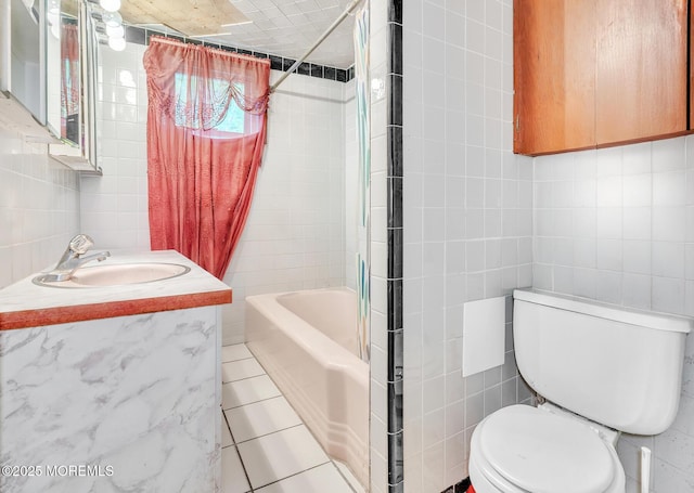 137 Seabreeze Way, Keansburg, NJ 07734 - bathroom with tile walls, toilet, vanity, tile patterned flooring, and shower / tub combo
