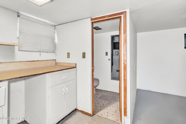 137 Seabreeze Way, Keansburg, NJ 07734 - kitchen featuring white cabinetry, concrete flooring, and light countertops