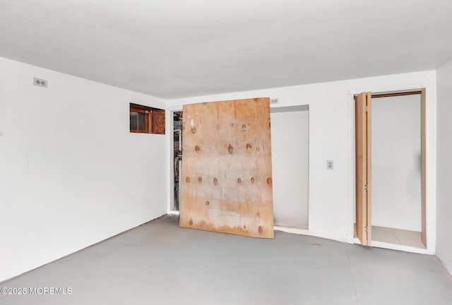 137 Seabreeze Way, Keansburg, NJ 07734 - unfurnished bedroom with finished concrete flooring