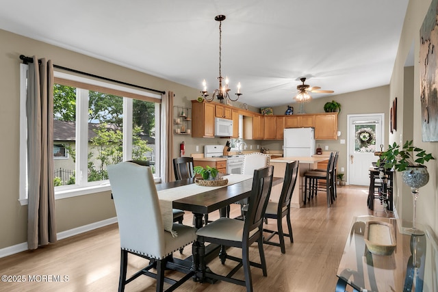 324 Boland Ave, Brick, NJ 08724 - dining area with light wood finished floors, a ceiling fan, baseboards, and a chandelier