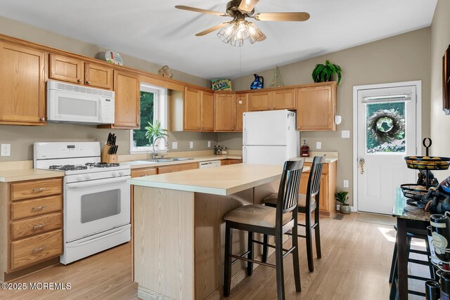 324 Boland Ave, Brick, NJ 08724 - kitchen featuring white appliances, a sink, ceiling fan, light countertops, and light wood-type flooring