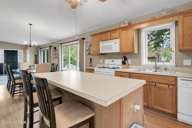 324 Boland Ave, Brick, NJ 08724 - kitchen featuring white appliances, a sink, light countertops, and light wood-style floors