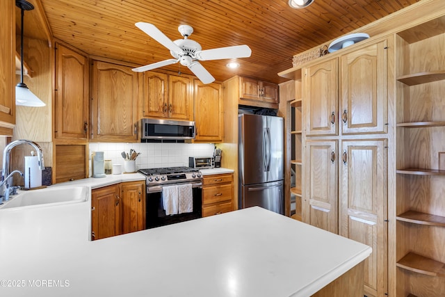 36 Wilson Dr, Howell, NJ 07731 - kitchen featuring appliances with stainless steel finishes, open shelves, ceiling fan, a sink, and light countertops