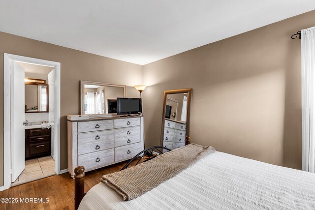 36 Wilson Dr, Howell, NJ 07731 - bedroom featuring light wood-style flooring and connected bathroom