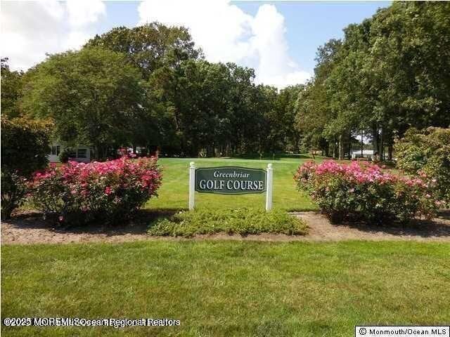 5 Lodge Ct, Brick, NJ 08724 - community sign with a lawn