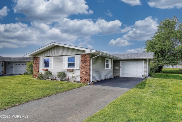 5 Lodge Ct, Brick, NJ 08724 - single story home featuring a garage, asphalt driveway, and a front yard