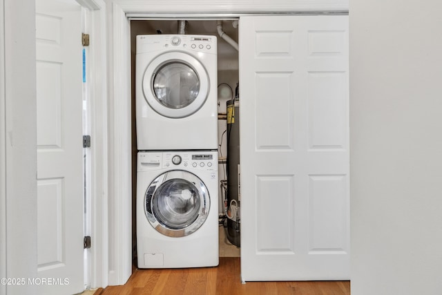 5 Lodge Ct, Brick, NJ 08724 - laundry area featuring stacked washer and clothes dryer and wood finished floors