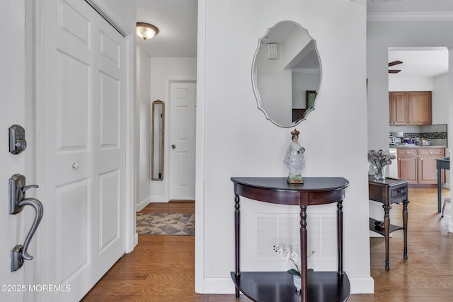 5 Lodge Ct, Brick, NJ 08724 - hallway featuring wood finished floors and ornamental molding