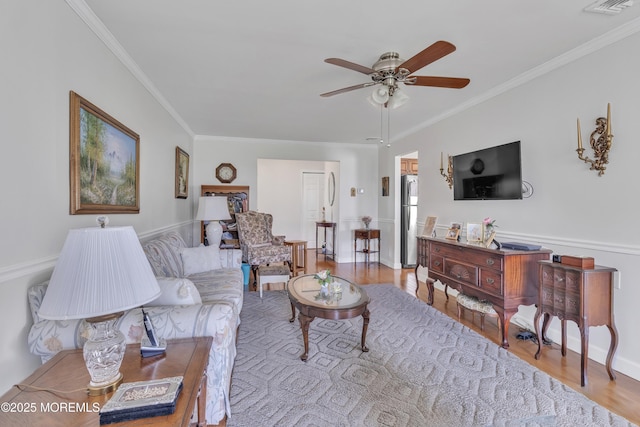 5 Lodge Ct, Brick, NJ 08724 - living room with crown molding, ceiling fan, and wood finished floors