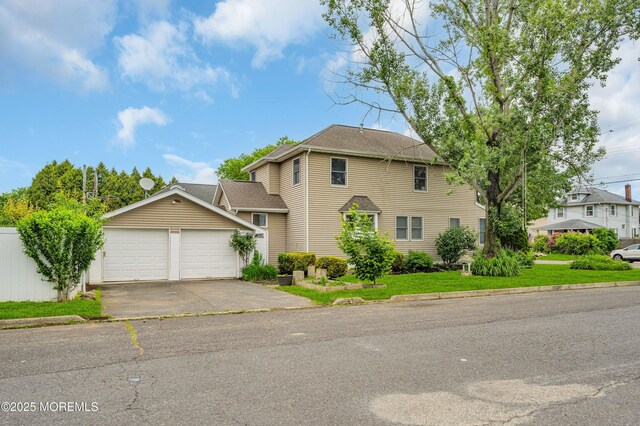 645 Campbell Ave, Long Branch, NJ 07740 - view of front of property with driveway, a garage, and a shingled roof