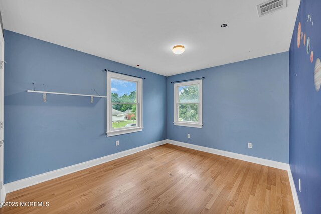 645 Campbell Ave, Long Branch, NJ 07740 - spare room featuring wood finished floors and baseboards