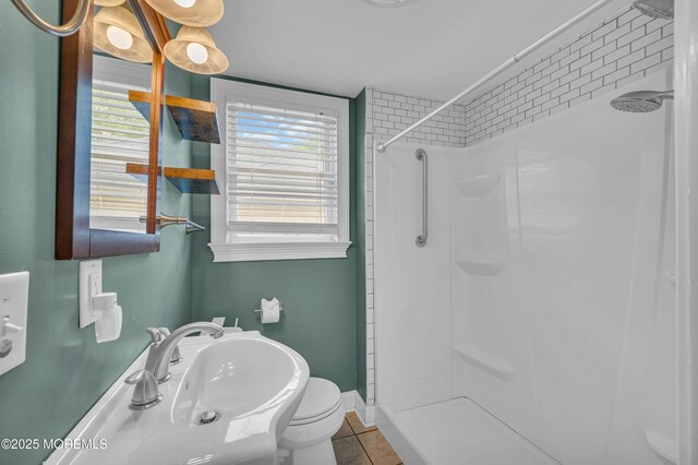 645 Campbell Ave, Long Branch, NJ 07740 - full bathroom with a shower, toilet, tile patterned floors, and baseboards