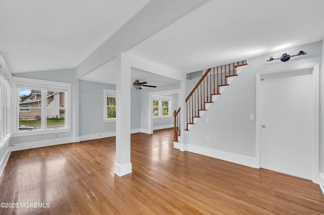645 Campbell Ave, Long Branch, NJ 07740 - unfurnished living room with stairway, light wood-style floors, baseboards, and a ceiling fan