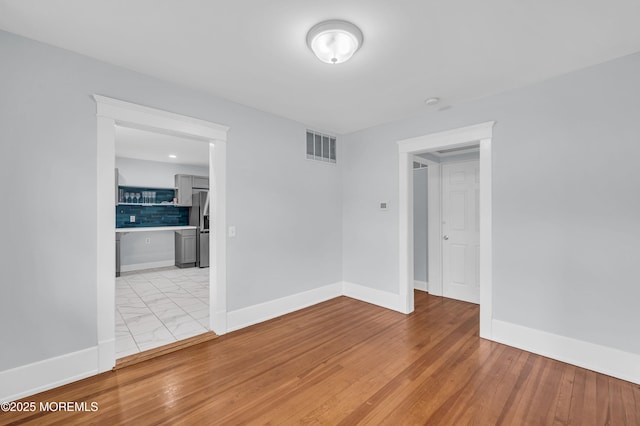 645 Campbell Ave, Long Branch, NJ 07740 - empty room featuring baseboards and light marble finish floors