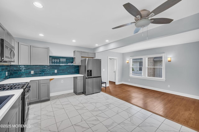 645 Campbell Ave, Long Branch, NJ 07740 - kitchen featuring appliances with stainless steel finishes, gray cabinets, light countertops, and recessed lighting