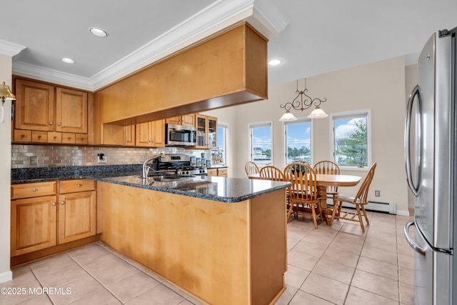 654 Fairview Ln, Forked River, NJ 08731 - kitchen with appliances with stainless steel finishes, light tile patterned flooring, a peninsula, a sink, and crown molding