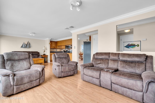 654 Fairview Ln, Forked River, NJ 08731 - living room with light wood-type flooring and crown molding