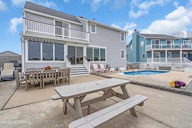 654 Fairview Ln, Forked River, NJ 08731 - rear view of property with a balcony, a patio area, entry steps, and outdoor dining area
