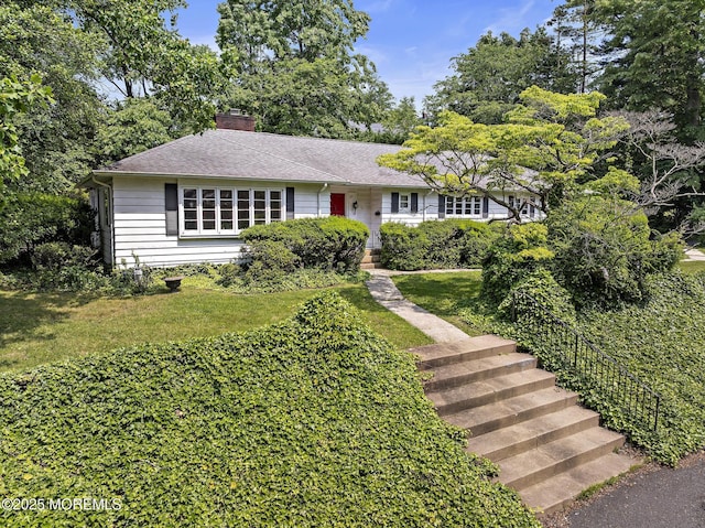 23 Fox Hill Dr, Little Silver, NJ 07739 - single story home featuring a chimney, a front lawn, and a shingled roof