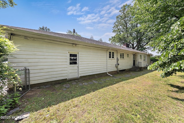 23 Fox Hill Dr, Little Silver, NJ 07739 - rear view of house featuring entry steps, a yard, and a chimney