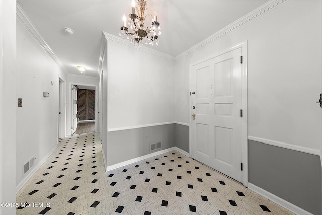 23 Fox Hill Dr, Little Silver, NJ 07739 - entryway with baseboards, light flooring, a chandelier, and crown molding