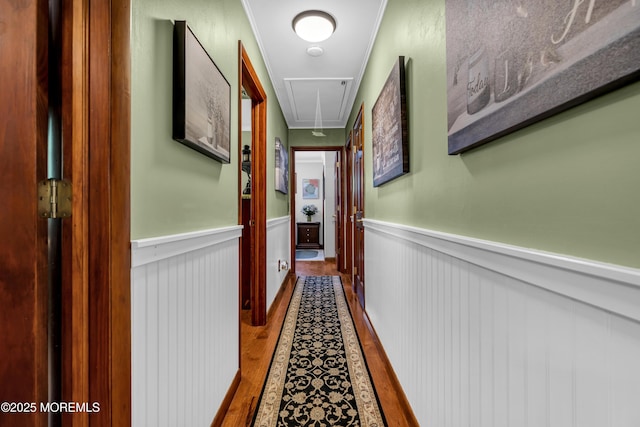 711 Hardean Rd, Brick, NJ 08724 - hall with wainscoting, attic access, and wood finished floors