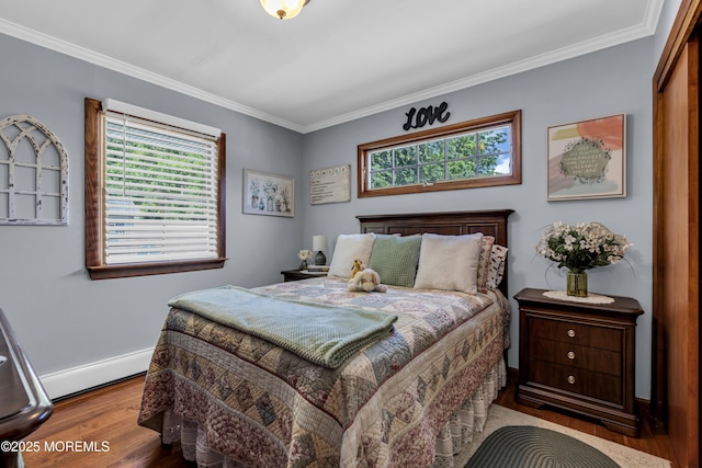 711 Hardean Rd, Brick, NJ 08724 - bedroom featuring wood finished floors, a baseboard heating unit, baseboards, and ornamental molding