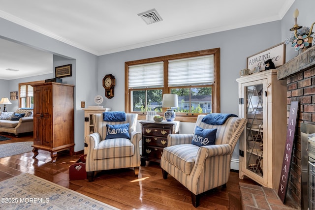 711 Hardean Rd, Brick, NJ 08724 - living area with dark wood finished floors, ornamental molding, baseboard heating, and baseboards