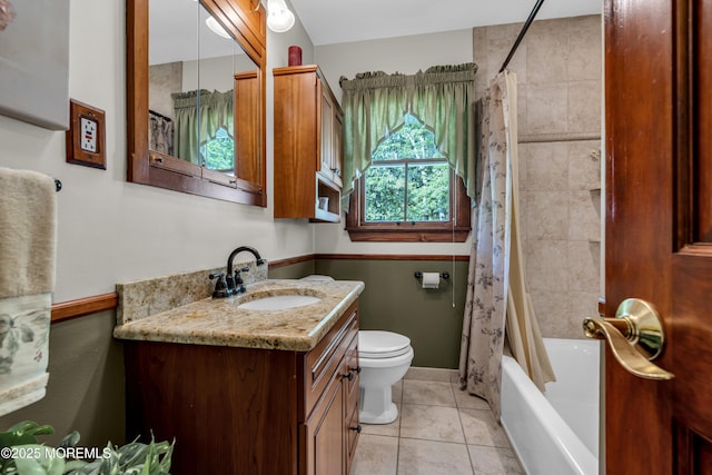 711 Hardean Rd, Brick, NJ 08724 - bathroom featuring vanity, toilet, tile patterned flooring, shower / tub combo with curtain, and baseboards