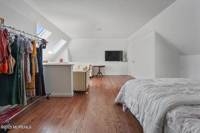 2 Warrenton Ln, Colts Neck, NJ 07722 - bedroom featuring wood finished floors, vaulted ceiling, and a skylight