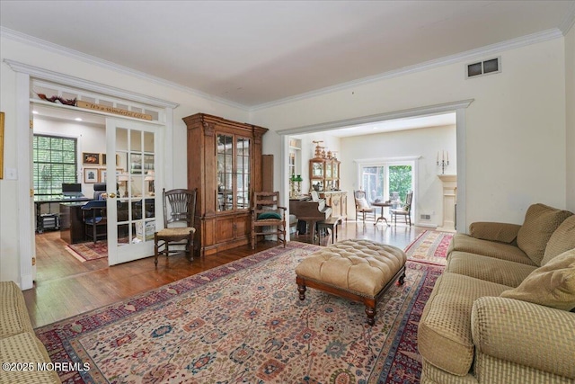 2 Warrenton Ln, Colts Neck, NJ 07722 - living room featuring wood finished floors, crown molding, a desk, and french doors